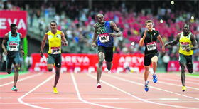 Usain Bolt of Jamaica crosses the finish line to win the mens 200m event at the IAAF Diamond League athletics meet in Saint-Denis near Paris on Saturday night.