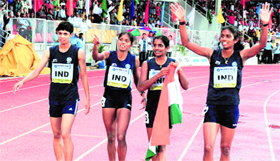 Nirmala,Tintu Luka, Anu Mariam Jose, Poovamma celebrate after winning the gold.