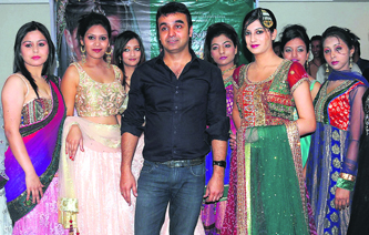 Price point: Designer Amit Kashyap with models showcasing his collection