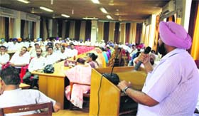 Mayor Baljit Singh Birbehman addresses the staff of the Municipal Corporation at a farewell function organised for the outgoing councillors