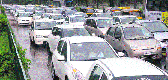 Vehicles stuck in a traffic jam on the Chandigarh-Panchkula road on Monday.