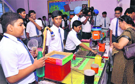 Participants answer the queries of the visitors at the exhibition Our environment, organised on the premises of St Josephs Senior Secondary School, Sector 44.