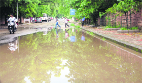 The entrance to Advanced Cardiac Centre at the PGI remain waterlogged in Chandigarh on Monday.