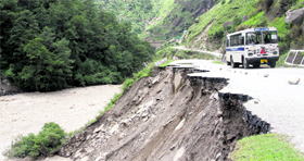 A road damaged by the Alaknanda river near Vishnuprayag in Garhwal.
