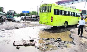 A damaged road at the entrance of the bus stand in Jalandhar