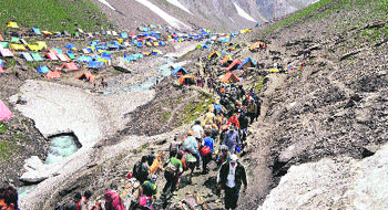 Pilgrims on their way to the Amarnath cave shrine near Baltal on Monday. 