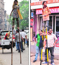 Two girls on stilts find a novel way to attract attention in Ludhiana.