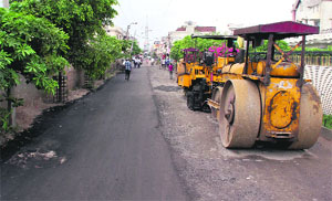 A road that was re-carpeted on a rainy day in Ludhiana.