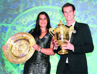 Andy Murray, Marion Bartoli celebrate titles at Wimbledon ball. 