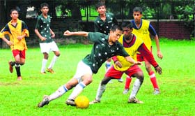 Players in action during a match of the Pre-Subroto Cup Football Tournament for Boys (U-17) at the Sector 17 football stadium in Chandigarh on Tuesday