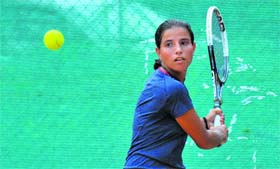 A player returns a shot during a match at the YMCA, Sector 11, Chandigarh, on Tuesday