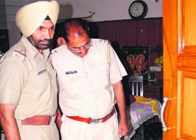 The police inspects the house where the theft took place at Sector 15 in Panchkula on Tuesday