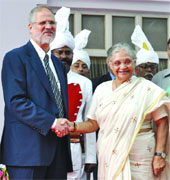 Chief Minister Sheila Dikshit greets the new Lieutenant Governor at Raj Niwas in New Delhi on Tuesday. 