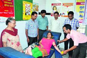 A woman donates blood in Haridwar on Tuesday