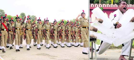 The passing-out parade of the Indo-Tibetan Border Police held at the training centre of 23rd Battalion at Seemadwar, Dehradun, on Tuesday; and (right) an ITBP jawan breaks ice slabs during a multi-activity display on the occasion