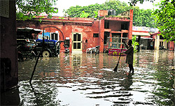 With Karnal receiving 32.4 mm of rainfall in the past 24 hours, the Nagar Nigam office looks like a swimming pool on Tuesday. Committee Chowk, Railway road and other low-lying areas of the city were flooded after the downpour