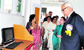 Governor NN Vohra inspecting a computer lab at a local school in Srinagar.