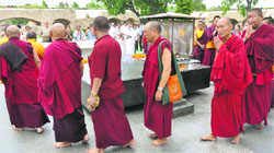 Buddhist monks at an inter-faith prayer meeting at the Raj Ghat in New Delhi on Tuesday. Tribune photo: Mukesh Aggarwal