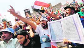 Supporters of deposed President Mursi protest in Cairo on Tuesday.