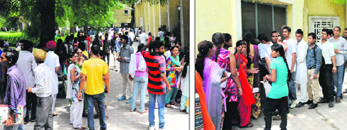 A crowd of admission seekers at Government Rajindra College in Bathinda on Wednesday; students (right) stand in a queue to deposit their fee at the college. 