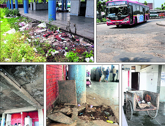 Garbage strewn over the ground adjacent to platforms; an uncarpeted road at the entrance welcomes passengers; rehri for carrying waste material parked unattended outside urinals; tiles on the floor remain damaged; and a roof leaks after rain at the Sector 43 ISBT in Chandigarh