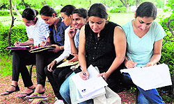 Students seeking admission to Panjab University fill forms