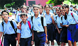 A school principal said buying uniforms for students had become a big headache