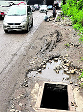 An uncovered manhole on the Narwal road in Jammu
