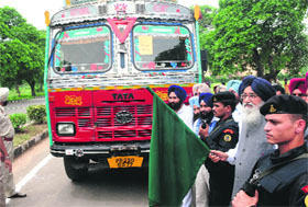 CM Parkash Singh Badal flags off trucks carrying relief material in Mohali on Wednesday