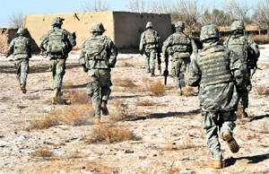 U.S. Army soldiers respond to a small arms attack in Badula Qulp, Afghanistan.