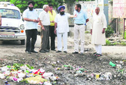 Sr Dy Mayor Kamaljit Singh takes a round of garbage dumping sites in Jalandhar on Thursday. Tribune Photo: Malkiat Singh