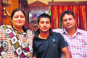 Shubham Khajuria with his parents in Jammu on Thursday