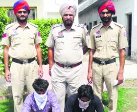 The robbers in police custody at Dehlon