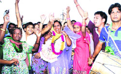Supporters of a winning candidate celebrate as the results of a panchayat repoll in Bathonian village near Rajpura were announced on Tuesday.