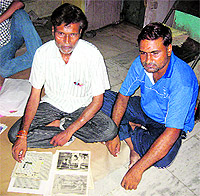 Gajender and Mahinder with the memories of younger brother Yogender at their home Gwalior