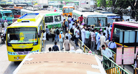 Private bus operators protest against the increase in the adda fee in Bathinda on Friday.