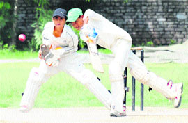 Players in action during a match between Saupins and Satluj, Panchkula, at the second semifinal of the 5th Ashok Kumar Vij Memorial U-13 Cricket Tournament in Chandigarh on Friday.