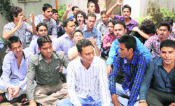 DBS (PG) College students stage a dharna on the college campus in Dehradun on Friday. 
