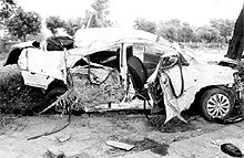The mangled remains of a car that rammed into a tree at Fatehabad on Friday