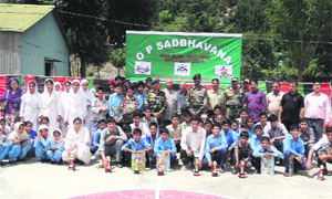 Students with their trophies and prizes in Kishtwar on Friday. 