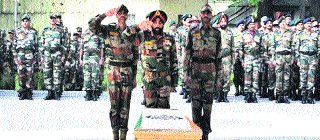 GOC Chinar Corps Lt Gen Gurmit Singh during the wreath-laying ceremony in Srinagar on Friday. 