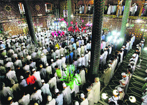 Muslims offer prayers at the Shah-i-Hamdaan Shrine on the first Friday of holy month of Ramadan in Srinagar on Friday. 