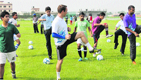Students of Ivy World School train during a skill training workshop at the school ground in Jalandhar on Friday.