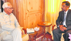 Chairman and Managing Director Pawan Hans Ltd Anil Srivastava during a meeting with Governor NN Vohra. 