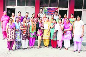 The newly-elected members of the district unit of the BJP pose for shutterbugs in Bathinda on Saturday