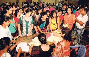 Students deposit admission forms at MCM DAV College in Sector 36, Chandigarh, on Saturday. 