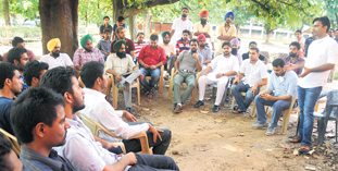 Rohit Chaudhary, all-India president, National Students Union of India, addresses party members at Panjab University on Saturday.