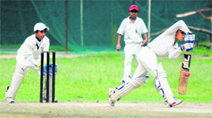 Players in action during the Guru Nanak Public Cricket Cup for Boys (U-12) at Guru Nanak Public School, Sector 36, Chandigarh, on Sunday.