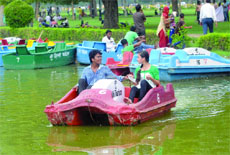 A teen couple enjoying boating near the Central Secretariat Metro station in New Delhi on Sunday. 