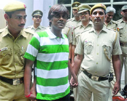 Delhi Police arrest the accused in New Delhi on Sunday. 